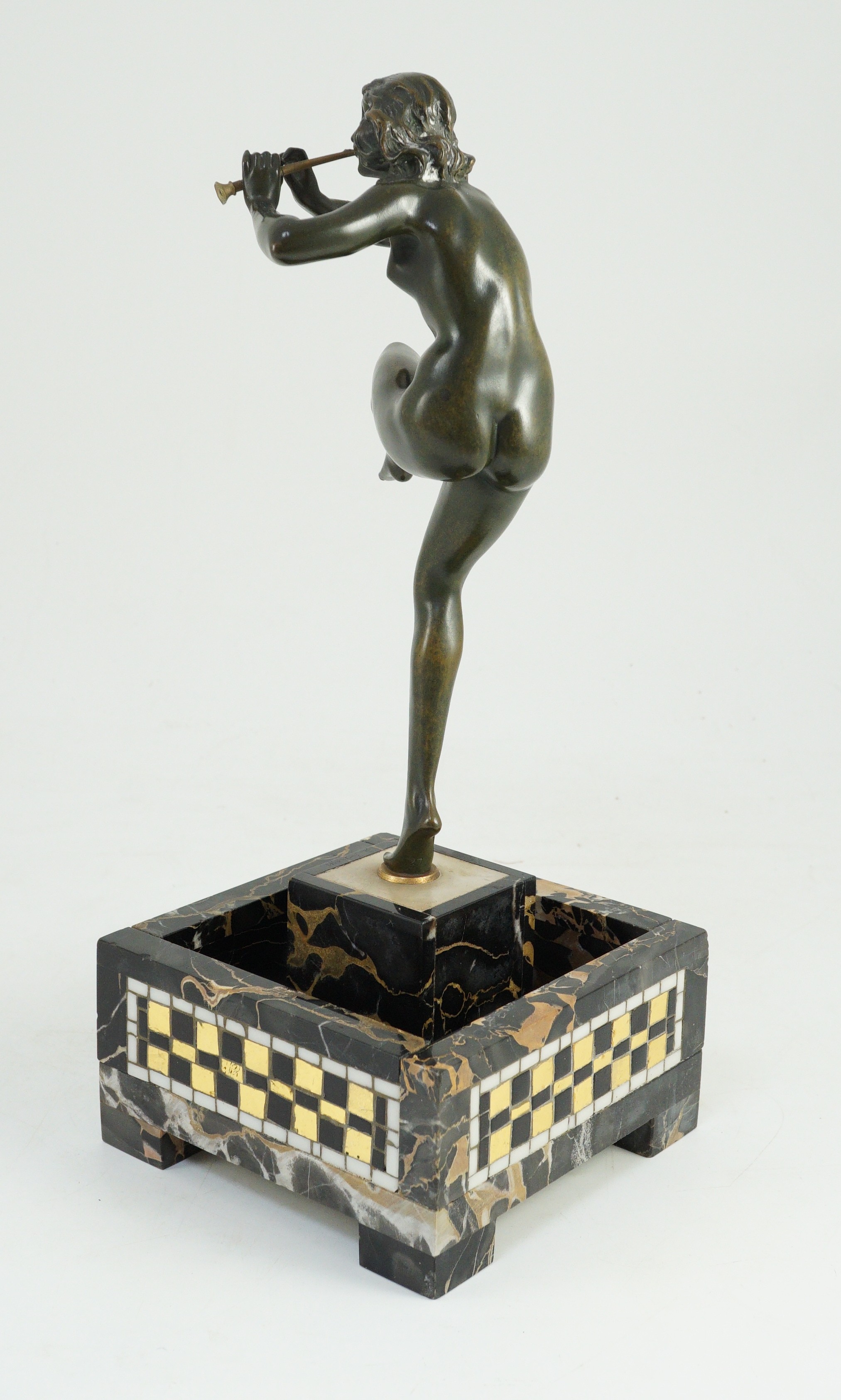 Pierre Le Faguays (1892-1962). An Art Deco bronze figure of a female pan piper, 15cm wide 37cm high overall